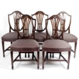 A set of 12 reproduction mahogany framed Hepplewhite style chairs,