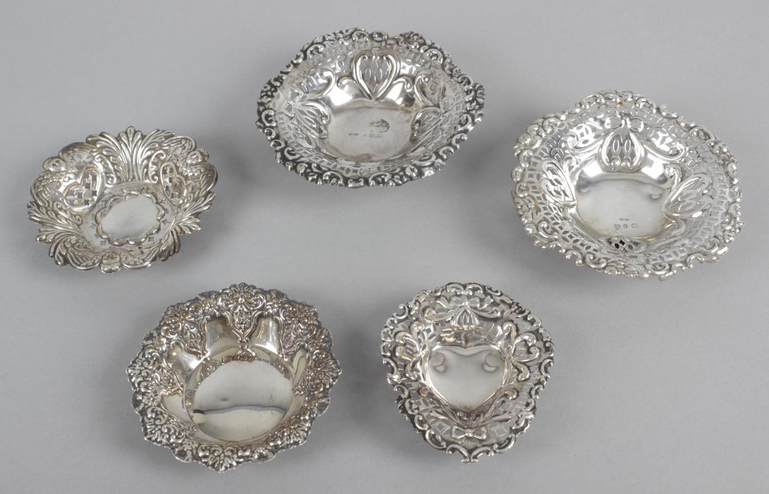 A selection of small pierced or embossed silver dishes, - Image 3 of 4