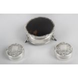 A 1920's silver mounted and tortoiseshell small circular box,