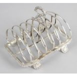 A William IV silver toast rack,