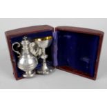 A Victorian silver travelling communion set,