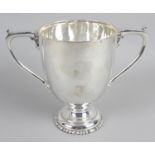 An Edwardian silver pedestal trophy cup,
