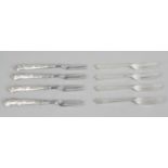 A large assortment of cutlery,