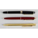 A gold plated Must de Cartier ballpoint pen,