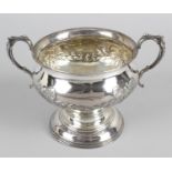A George V silver twin-handled pedestal bowl,
