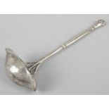 A small Georg Jensen silver ladle,