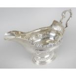 An early George III Scottish silver pedestal sauce boat,