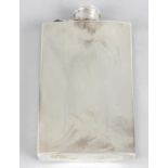 A silver hip flask,