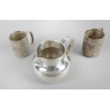 Two Edwardian silver christening mugs,