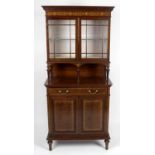 An Edwardian mahogany side cabinet,