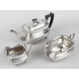 A 1920's silver matched three piece tea service,