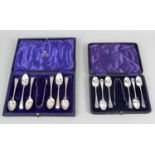Four cased sets of cutlery to include two cased sets of tea spoons with sugar nips,