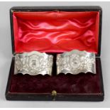 A pair of Victorian silver napkin rings,