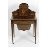 An Edwardian rosewood and stained wooden ladies' worktable,