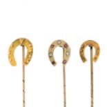 Three early 20th century horseshoe stickpins.