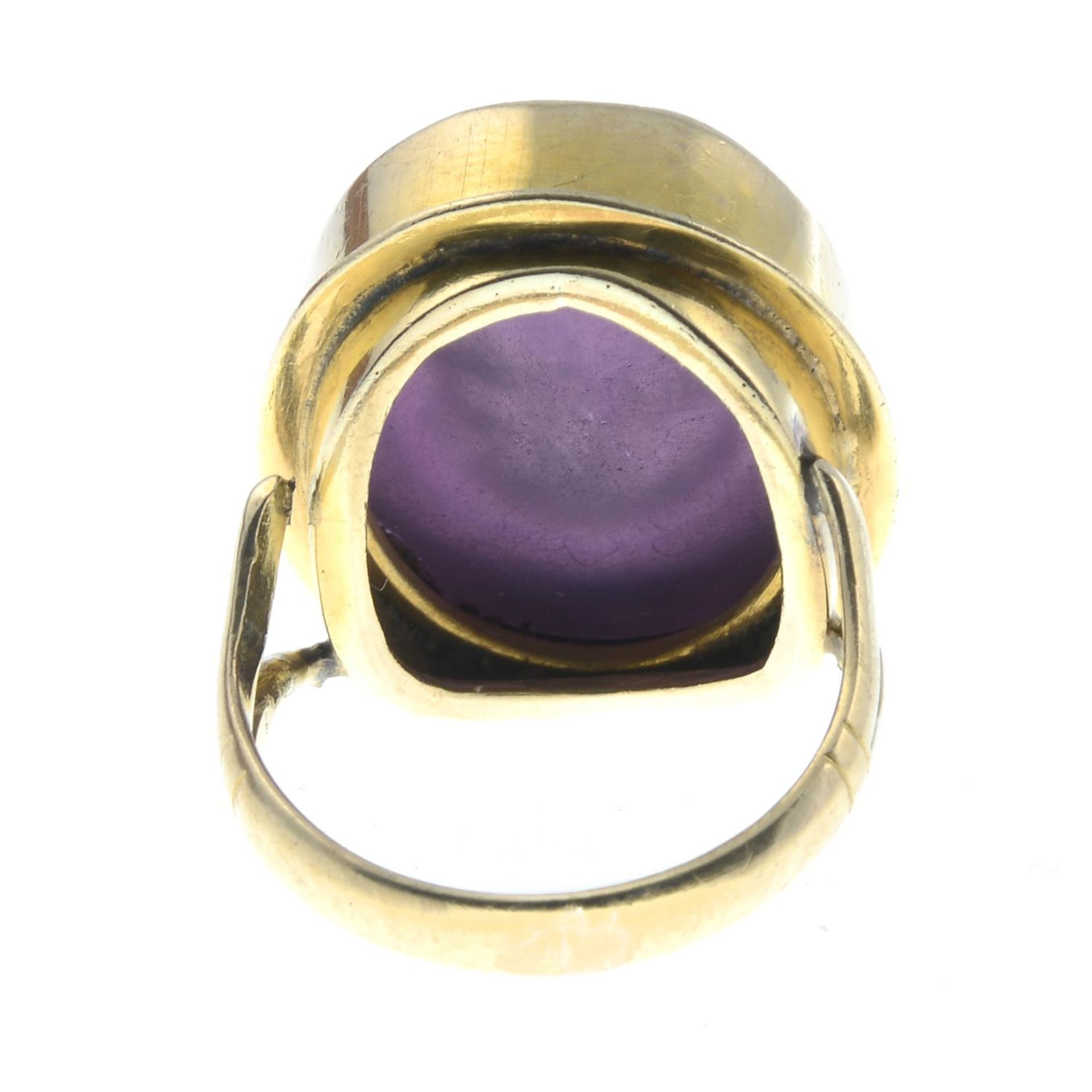 A gentleman's purple paste intaglio signet ring.Band replacement stamped 9ct.Ring size P. - Image 2 of 3