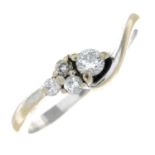 An 18ct gold diamond ring.Total diamond weight 0.20ct, stamped to band.Hallmarks for Birmingham.