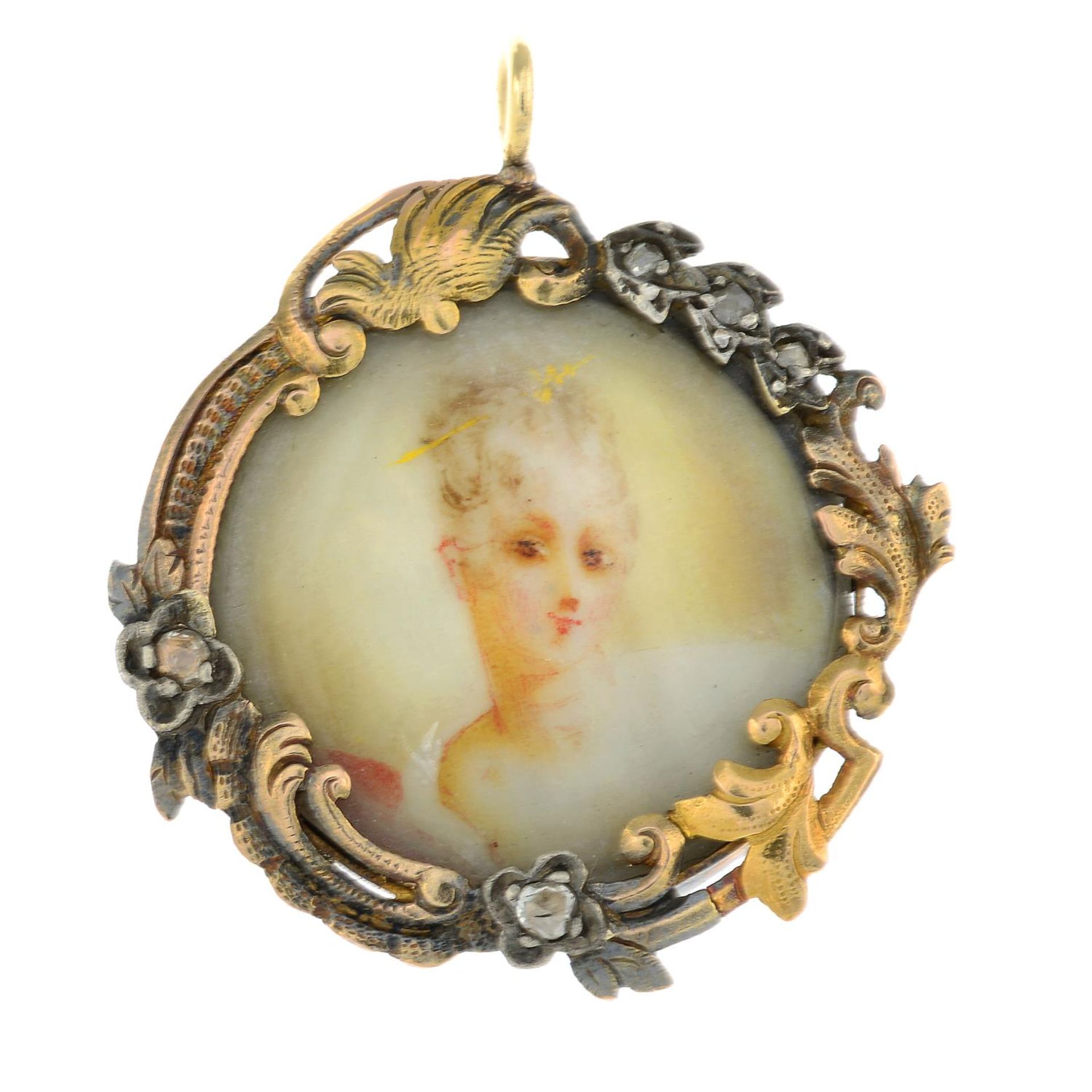 A late Georgian diamond and ivory portrait miniature locket.Length 3.2cms.