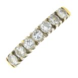 A diamond seven-stone band ring.Estimated total diamond weight 0.50ct.Stamped 18ct.