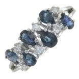 A sapphire and diamond dress ring.Total diamond weight 0.12ct.