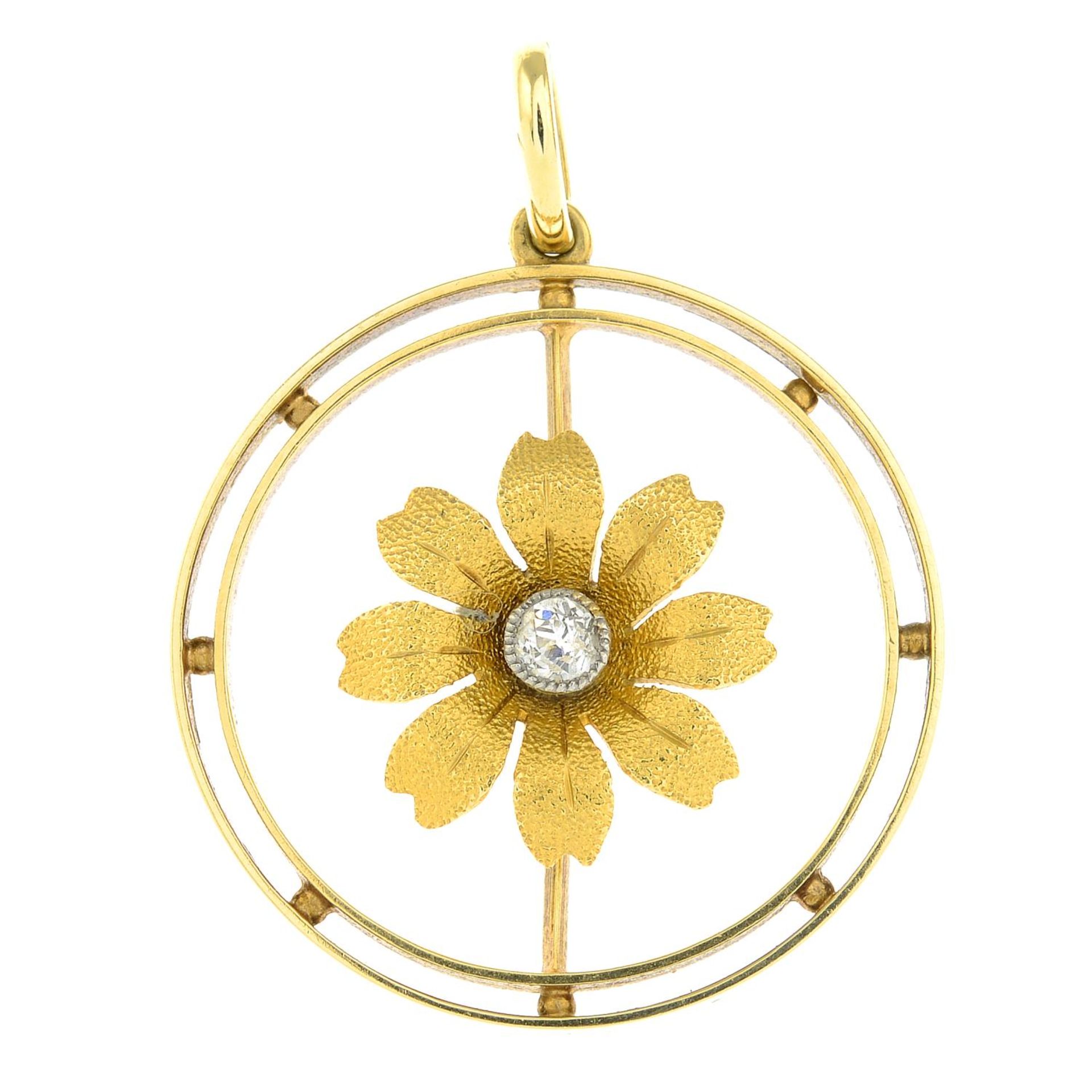 An early 20th century 15ct gold old-cut diamond floral pendant.