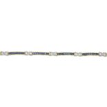 A 9ct gold sapphire and diamond bracelet.Hallmarks for 9ct gold.