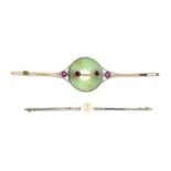 15ct gold jade and ruby bar brooch, stamped 15, length 6.7cms, 5gms.