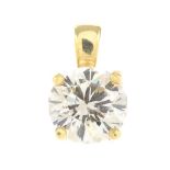 A diamond single-stone pendant.Estimated diamond weight 0.70ct, tinted colour, P1 clarity.