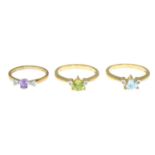 Three 9ct gold diamond and gem-set dress rings.