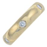 A 9ct gold brilliant-cut diamond band ring.Estimated total diamond weight 0.40ct,