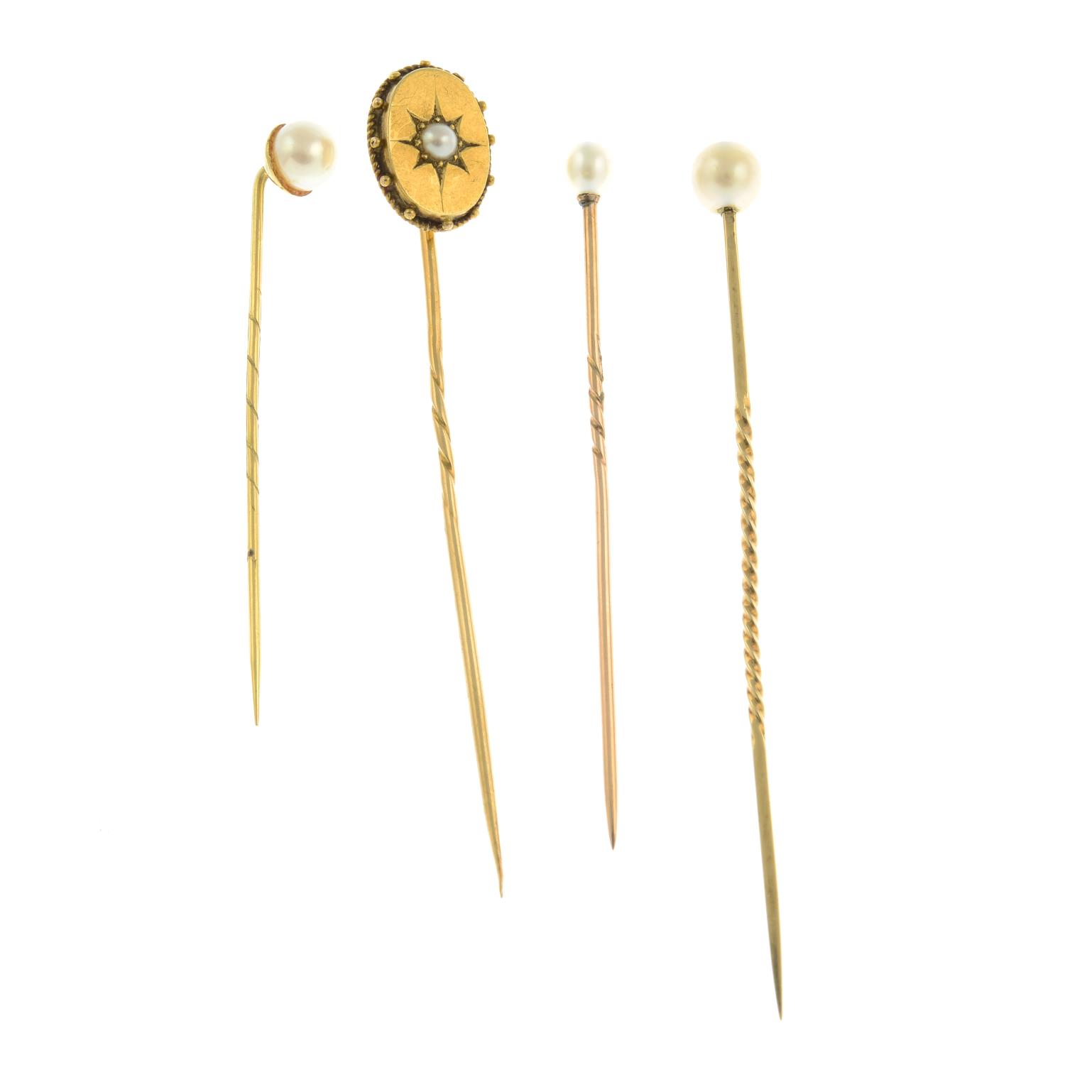 Three cultured pearl stickpins and a split pearl stickpin. - Image 2 of 3