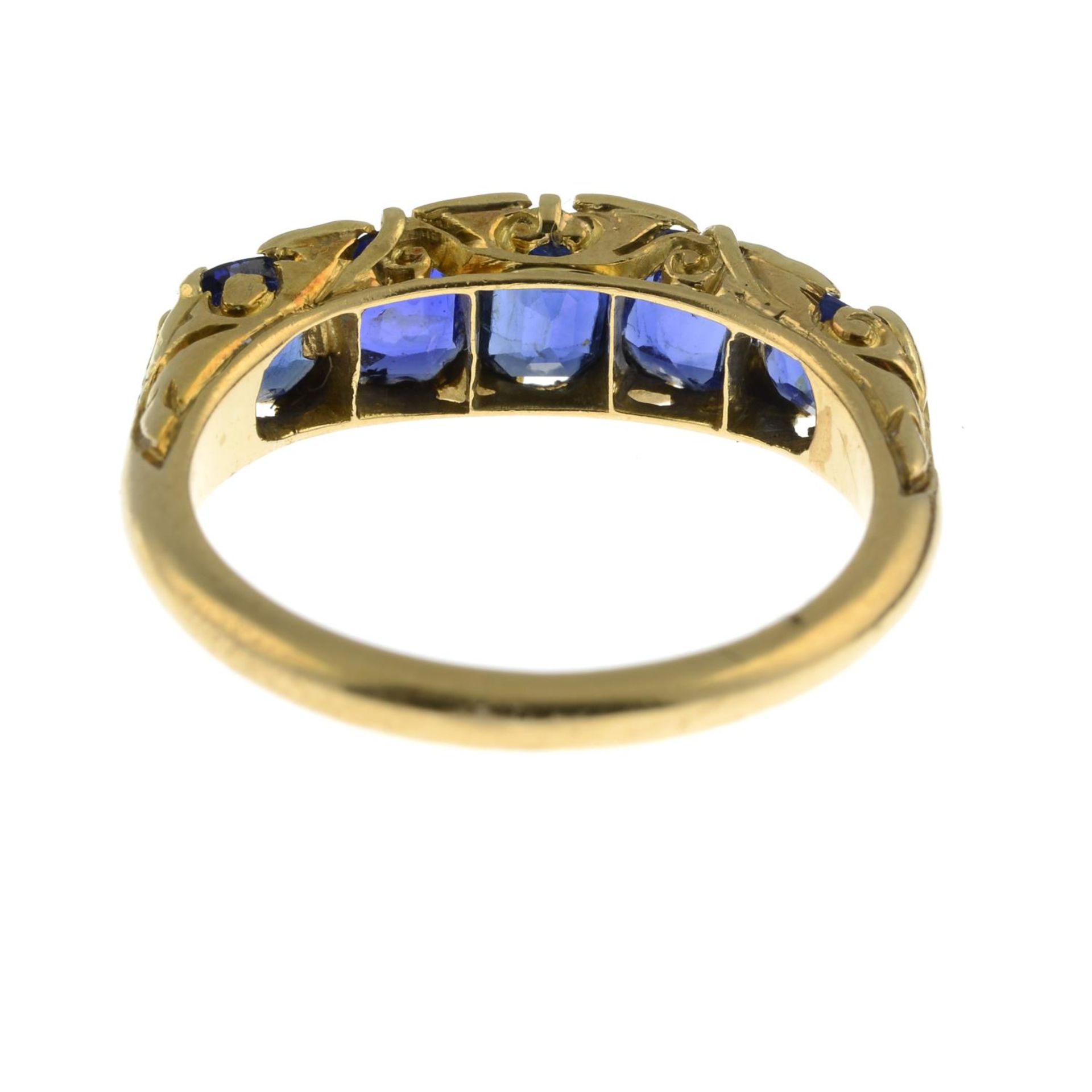 A sapphire five-stone ring, with rose-cut diamond spacers.Stamped 18. - Image 2 of 2