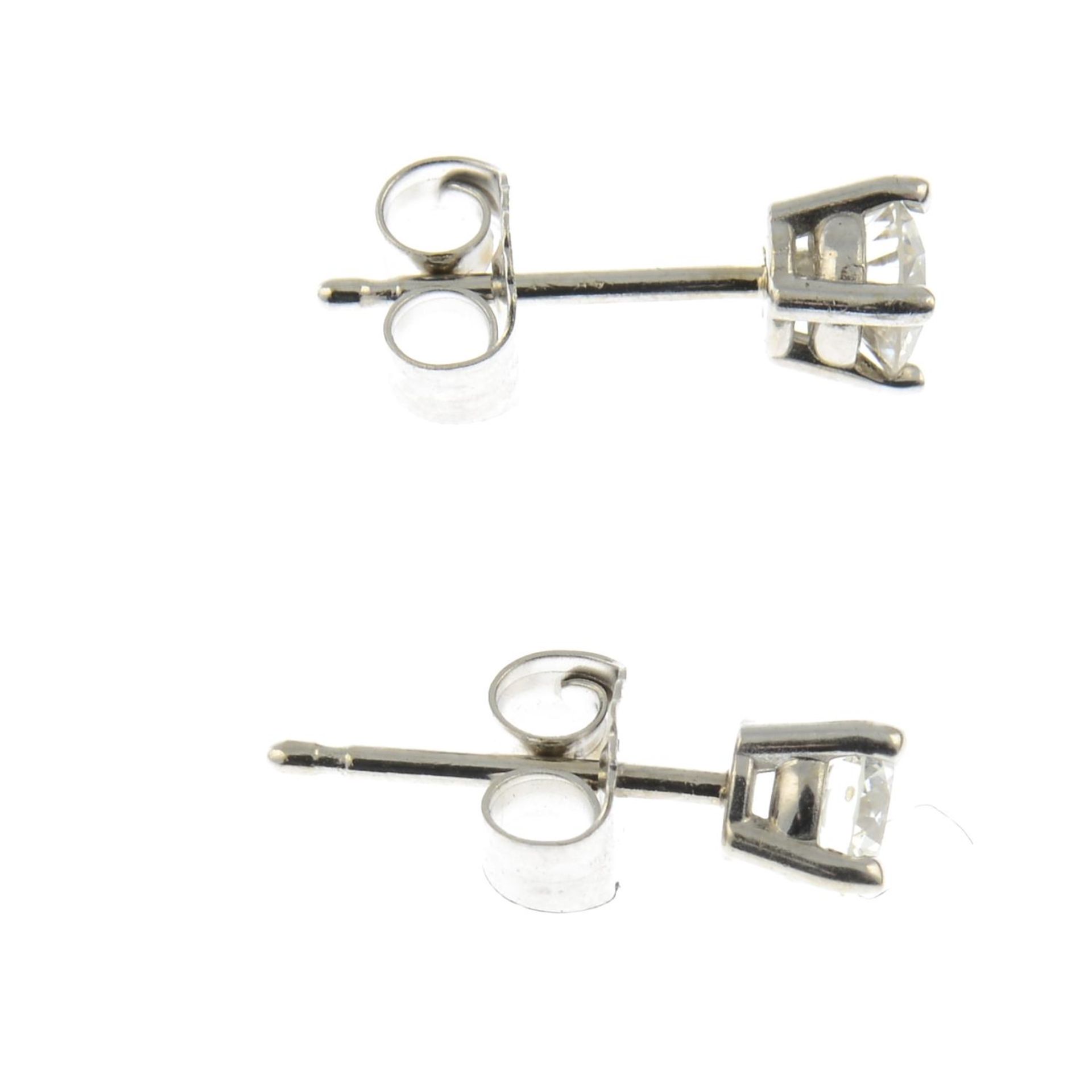 A pair of diamond stub earrings.Estimated total diamond weight 0.40ct, H-I colour, VS clarity. - Image 2 of 2