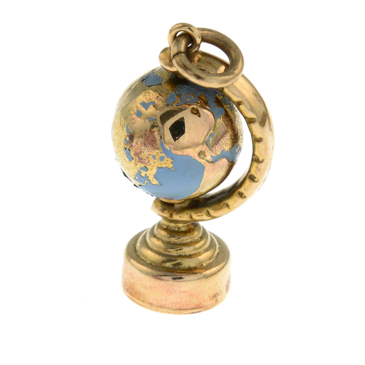 A 9ct gold and enamel charm, designed to depict a globe.Hallmarks for 9ct gold. - Image 2 of 2