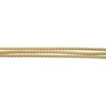 A 9ct gold three-row bracelet.Hallmarks for 9ct gold.