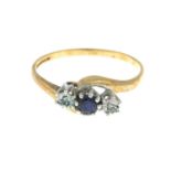 A 9ct gold sapphire and diamond three-stone ring.Hallmarks for 9ct gold.