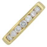 An 18ct gold diamond half eternity ring.Total diamond weight 0.60ct, stamped to band.