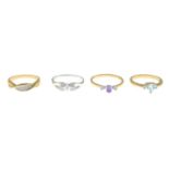 Four 9ct gold diamond and gem-set dress rings.