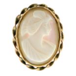 A conch shell cameo ring.Stamped 18ct.Ring size N.