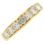 An 18ct gold diamond seven-stone band ring.Total diamond weight 0.75ct,