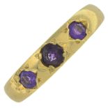An 18ct gold amethyst three-stone ring.Hallmarks for 18ct gold.