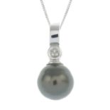 A cultured pearl and diamond pendant, with 9ct gold chain.