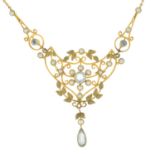 An early 20th century 15ct gold aquamarine and split pearl pendant,