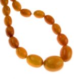 An amber single-strand necklace.