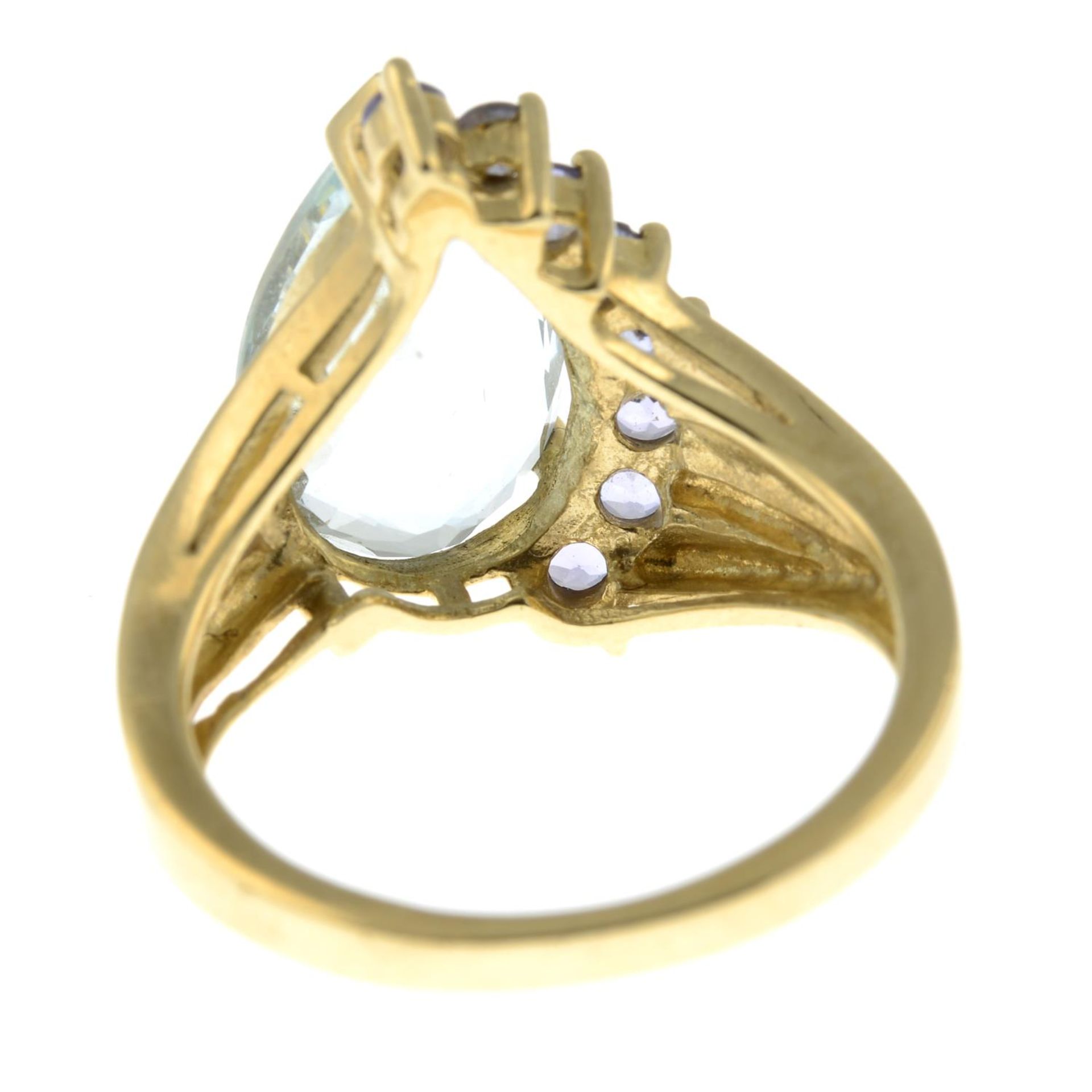 A 9ct gold aquamarine and gem-set dress ring.Hallmarks for 9ct gold. - Image 2 of 2