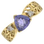 An 18ct gold tanzanite and brilliant-cut diamond ring.Estimated total diamond weight