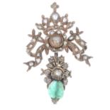 An emerald and foil-back rose-cut diamond pendant.