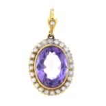 An early 20th century 15ct gold amethyst and split pearl pendant.Stamped 15CT.