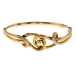 A late 19th century 9ct gold bangle.Stamped 9CT.