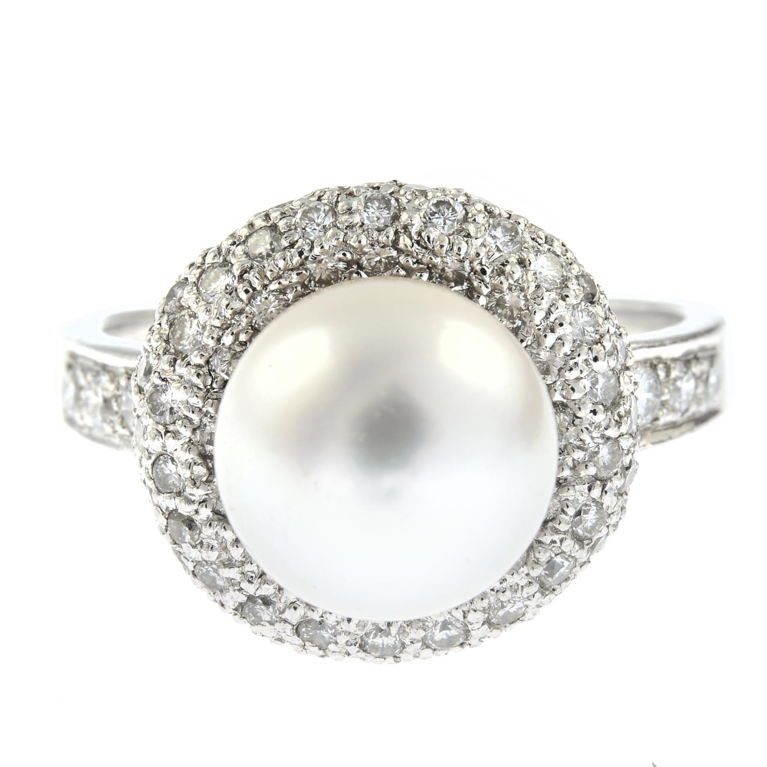 A platinum cultured pearl and pave-set diamond cocktail ring.Estimated total diamond weight